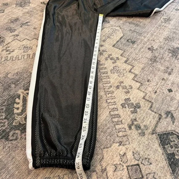 Supreme NYC men’s reflective bonded mesh track pants size large